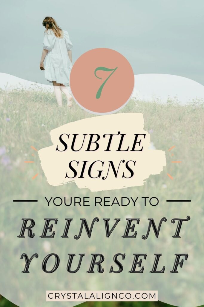 A woman in a white dress walking through a grassy field with soft hills in the background, overlaid text reading “Subtle Signs You’re Ready to Reinvent Yourself” and “crystalalignco.com".