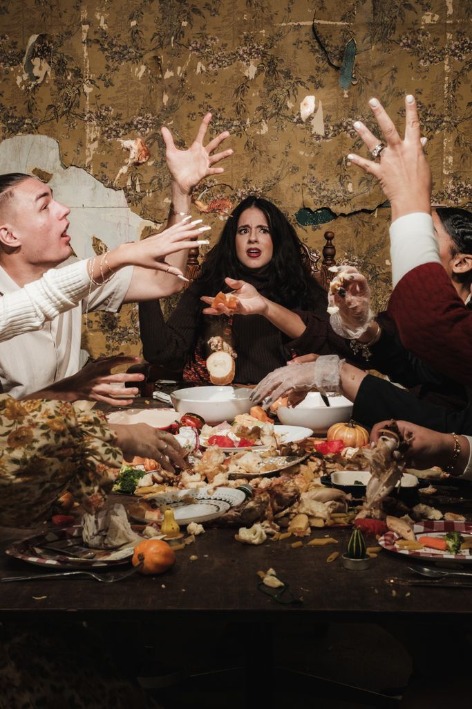 A lively scene of people engaging in a food fight around a festive dinner table while the woman wonders how to protect your peace.